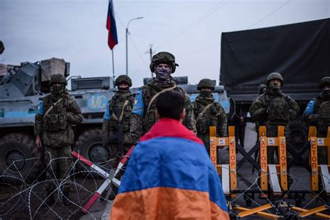 As Azerbaijan launches attacks in Nagorno-Karabakh, Moscow leans back